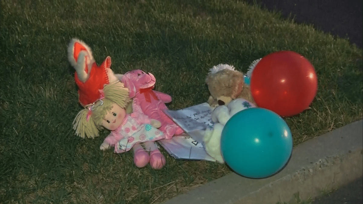 Friends and family have left stuffed animals on the yard of a family whose seven-year-old drowned, June 20, 2018.