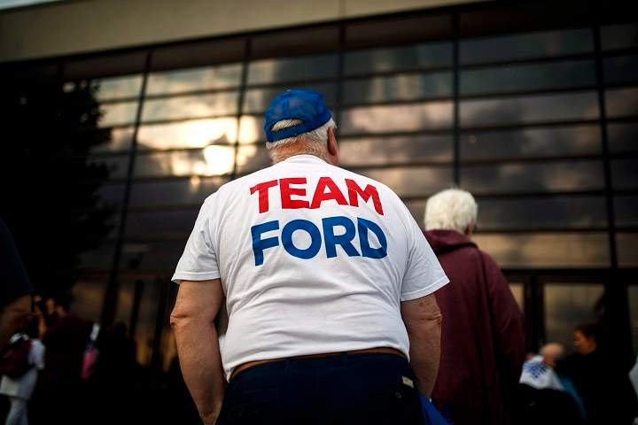A man stands outside at the election night headquarters for Ontario PC Leader Doug Ford during the Ontario Provincial election night in Toronto, on Thursday June 7, 2018. 