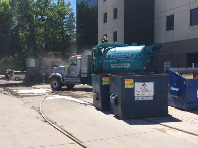 Explosion, fire damages vacuum truck in downtown Winnipeg - image