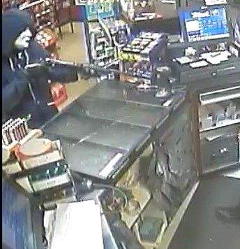 RCMP search for two suspects involved in a armed robbery at a Wetaskiwin, Alta. Mac's, Thurs., June 14, 2018. 
