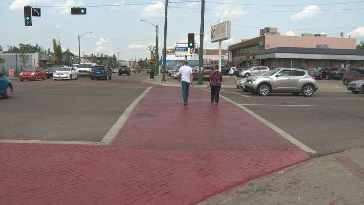 A crosswalk has been painted pink at 107 Avenue and 124 Street in Edmonton in order to make it safer for pedestrians.