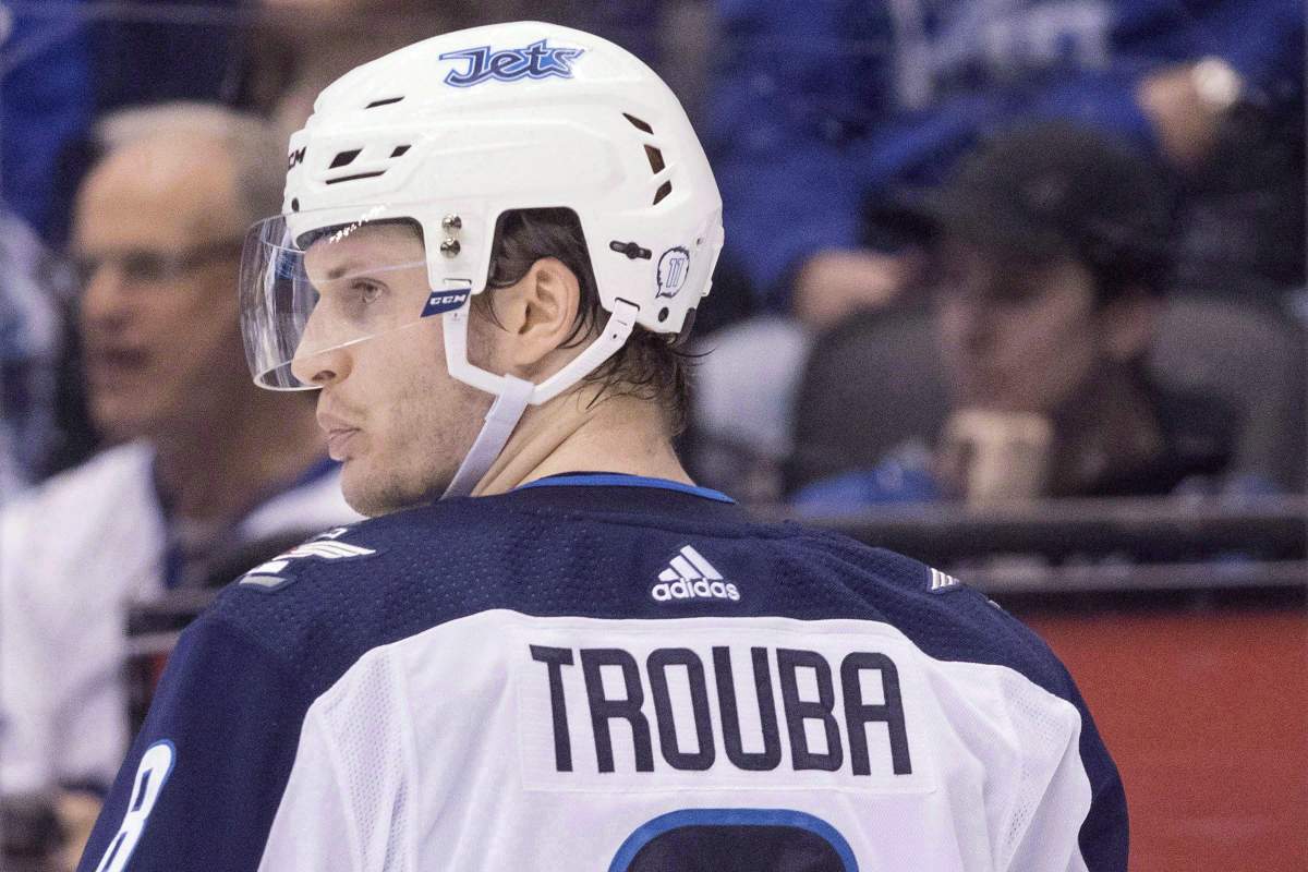 Winnipeg Jets' Jacob Trouba (8) is seen in action during second period NHL hockey action against the Toronto Maple Leafs, in Toronto on Saturday, March 31, 2018.