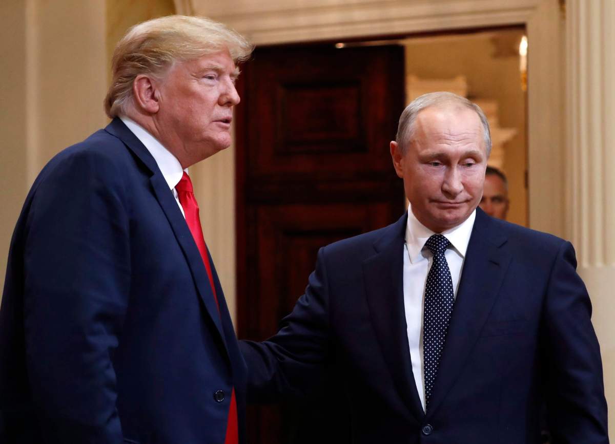 U.S. President Donald Trump, left, and Russian President Vladimir Putin leave a press conference after their meeting at the Presidential Palace in Helsinki, Finland, Monday, July 16, 2018. Canadian translators and their international counterparts say their job should be treated as strictly confidential and they shouldn't be compelled to testify about the conversations they hear. The declaration comes as U.S. Republicans on the House intelligence committee blocked a Democrat request today for Donald Trump's translator to testify about his lengthy conversation with Vladimir Putin in Helsinki on Monday.