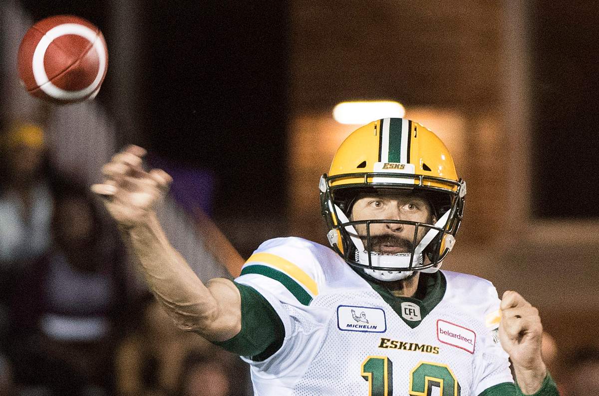 Edmonton Eskimos quarterback Mike Reilly throws a pass during second half CFL football action against the Montreal Alouettes in Montreal, Thursday, July 26, 2018. 