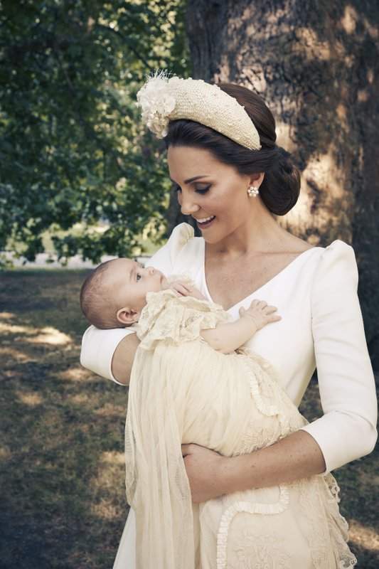 Kate, the Duchess of Cambridge, holds Prince Louis in an official photograph to mark the christening of Prince Louis following his baptism, in London. (Matt Holyoak/Camera Press/Duke and Duchess of Cambridge via AP)