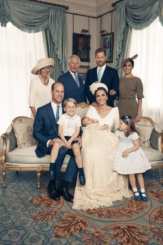 Seated, left to right: Prince William, The Duke of Cambridge; Prince George; Prince Louis; Kate, the Duchess of Cambridge; and Princess Charlotte. Standing, left to right: Camilla, The Duchess of Cornwall; Prince Charles, the Prince of Wales; Prince Harry, the Duke of Sussex; and wife Megan, the Duchess of Sussex. (Matt Holyoak/Camera Press/Duke and Duchess of Cambridge via AP)