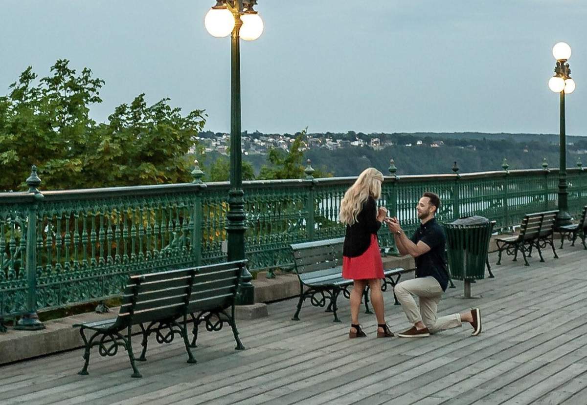 A photographer is looking for a couple after capturing an intimate moment in Quebec City.