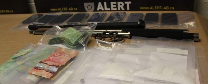 Drugs, weapons and cash police said they seized from a Lethbridge hotel room on July 12, 2018.