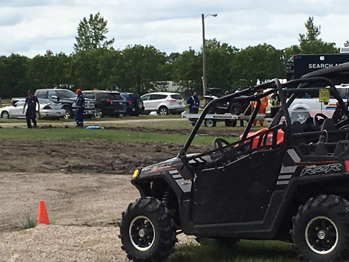 Searchers come and go from the Countryfest site Tuesday.