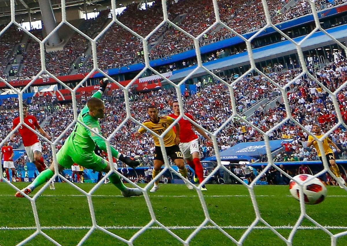 Eden Hazard (C) of Belgium scores the 2-0 against England goalkeeper Jordan Pickford during the FIFA World Cup 2018 third place soccer match between Belgium and England in St.Petersburg, Russia, 14 July 2018.