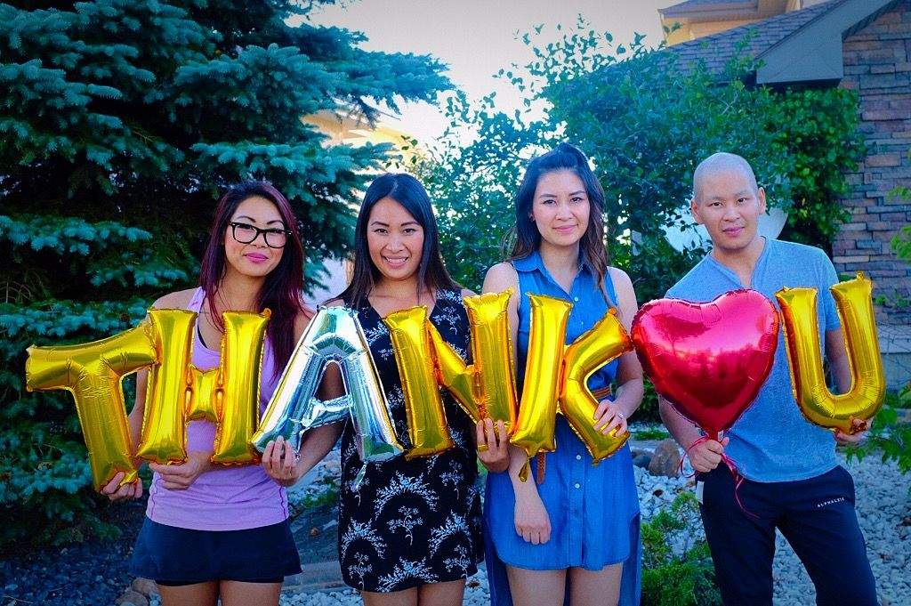 Bille Nguyen and sisters celebrating his stem cell match. 