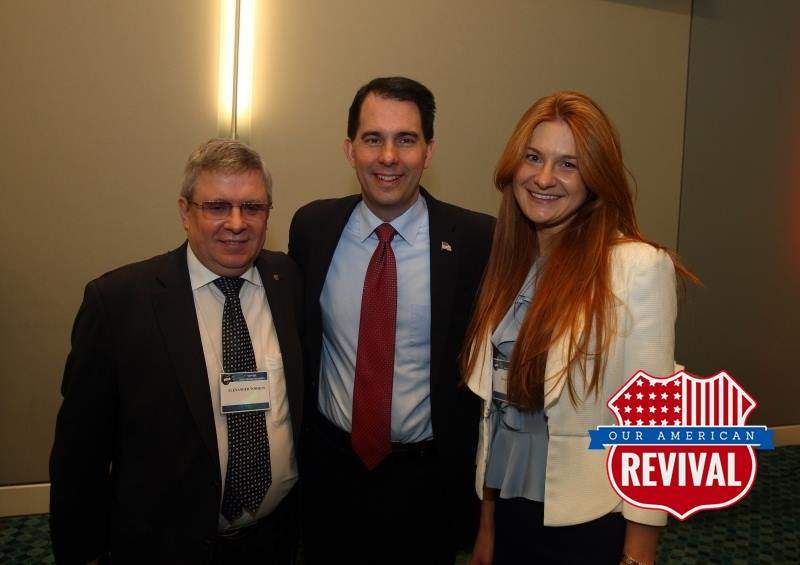 Wisconsin Gov. Scott Walker, centre, is shown with Russian oligarch Alexander Torshin, left, and Maria Butina in this photo posted on Butina’s Facebook page on April 24, 2015.