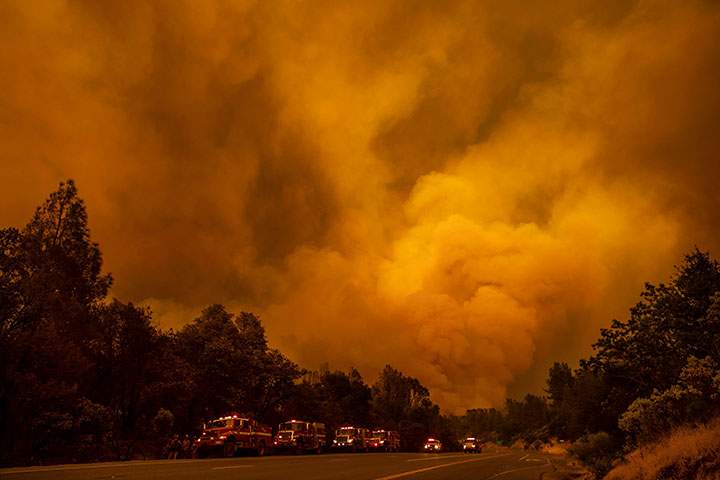 The Carr Fire burns along Highway 299 in Shasta, Calif., on Thursday, July 26, 2018.