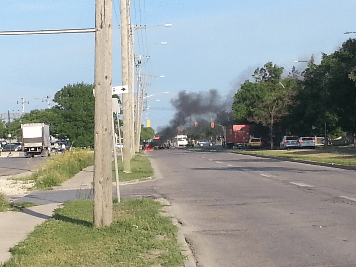 Smoke billows from a car fire on Notre Dame Avenue Thursday morning.