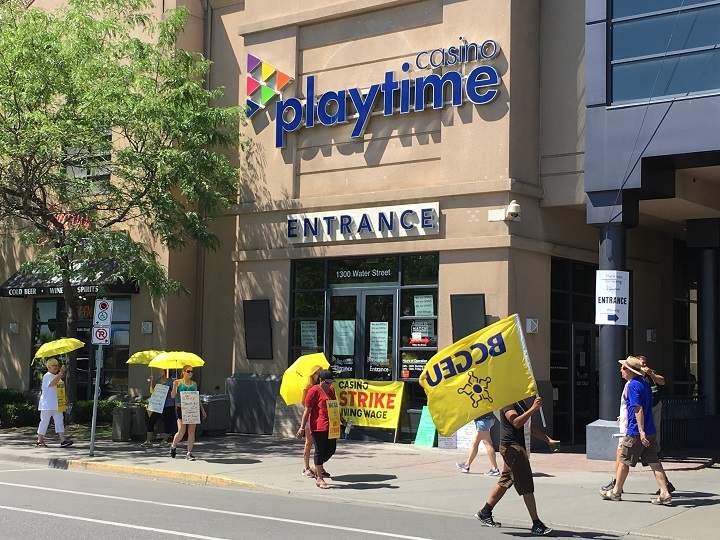 Employees strike outside a casino in Kelowna on Thursday.