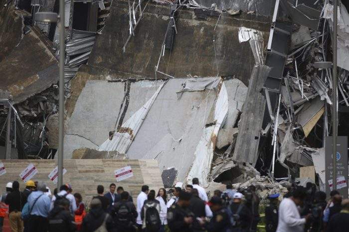 The mall collapsed after structural problems apparently led the mall’s operators to stage a quick, controlled demolition.