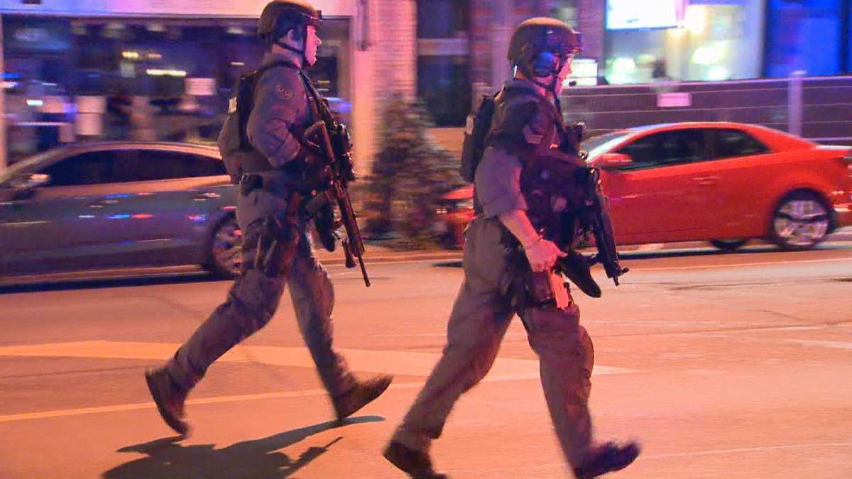 Police patrolled Danforth and Logan Avenues after the mass shooting in the area Sunday night.