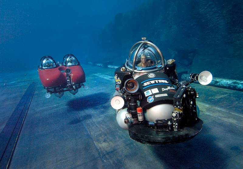 The DeepWorker 2000 submersible, right, is shown alongside another sub in Nuytco Research’s fleet.