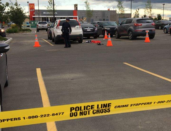 Shortly after 7 p.m. on Monday, a Global News crew saw someone be taken away from the scene by ambulance while police taped off a parking lot in the area of Ellerslie Road and Parsons Road.
