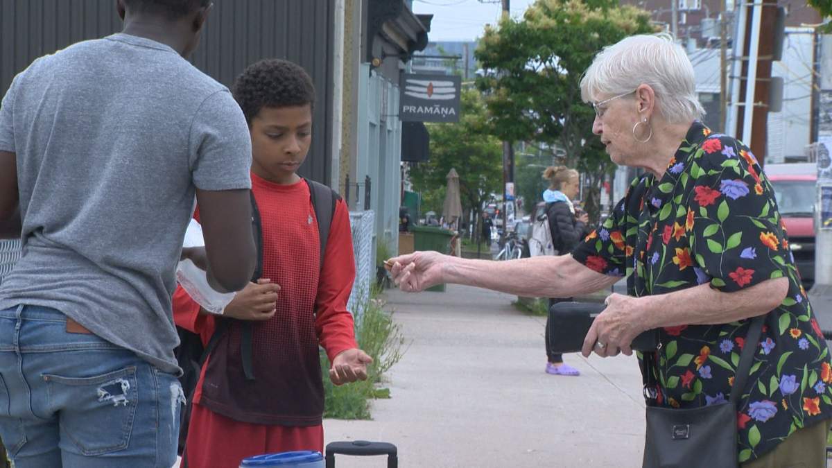 A sale by the Fruit Burst Lemonade team in action pictured in Halifax on July 18, 2018.