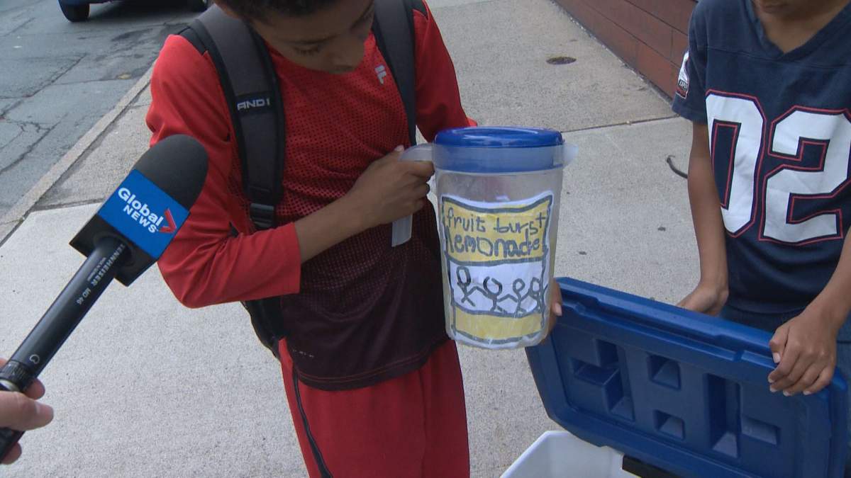 Adrius Stephenson with his team's homemade lemonade pictured in Halifax on July 18, 2018.