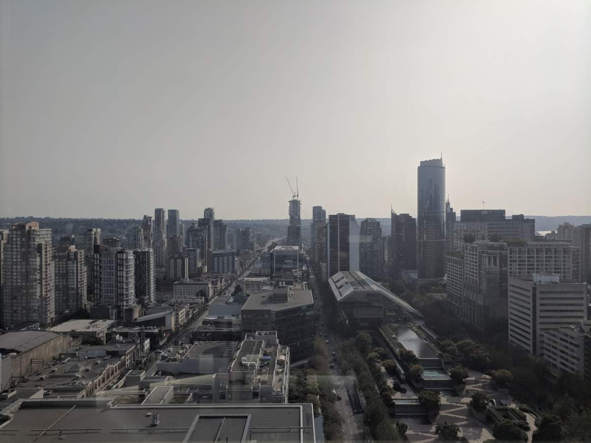 Smoke from a bog fire in Richmond, B.C. wildfires, and fires as far away as Greece contributed to a haze in Metro Vancouver on Friday.