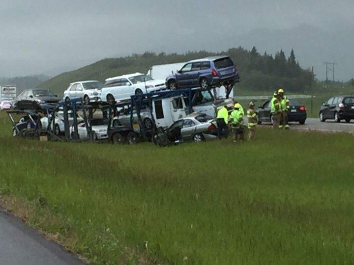 Police investigate a collision on Highway 1 west of Calgary on July 2, 2018.