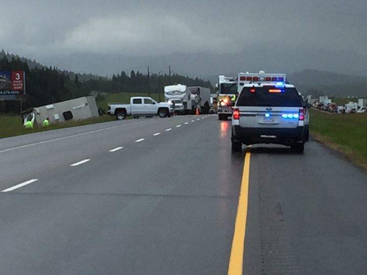Police investigate a collision on Highway 1 west of Calgary on July 2, 2018.