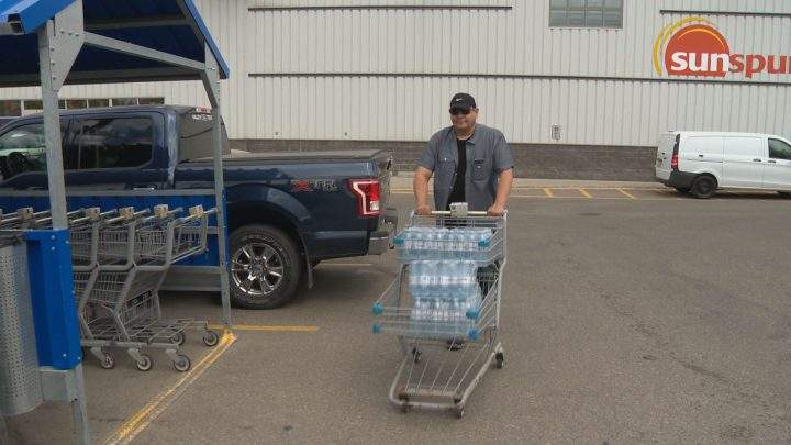 Saskatoon man gives out water to help the homeless survive the summer heat - image