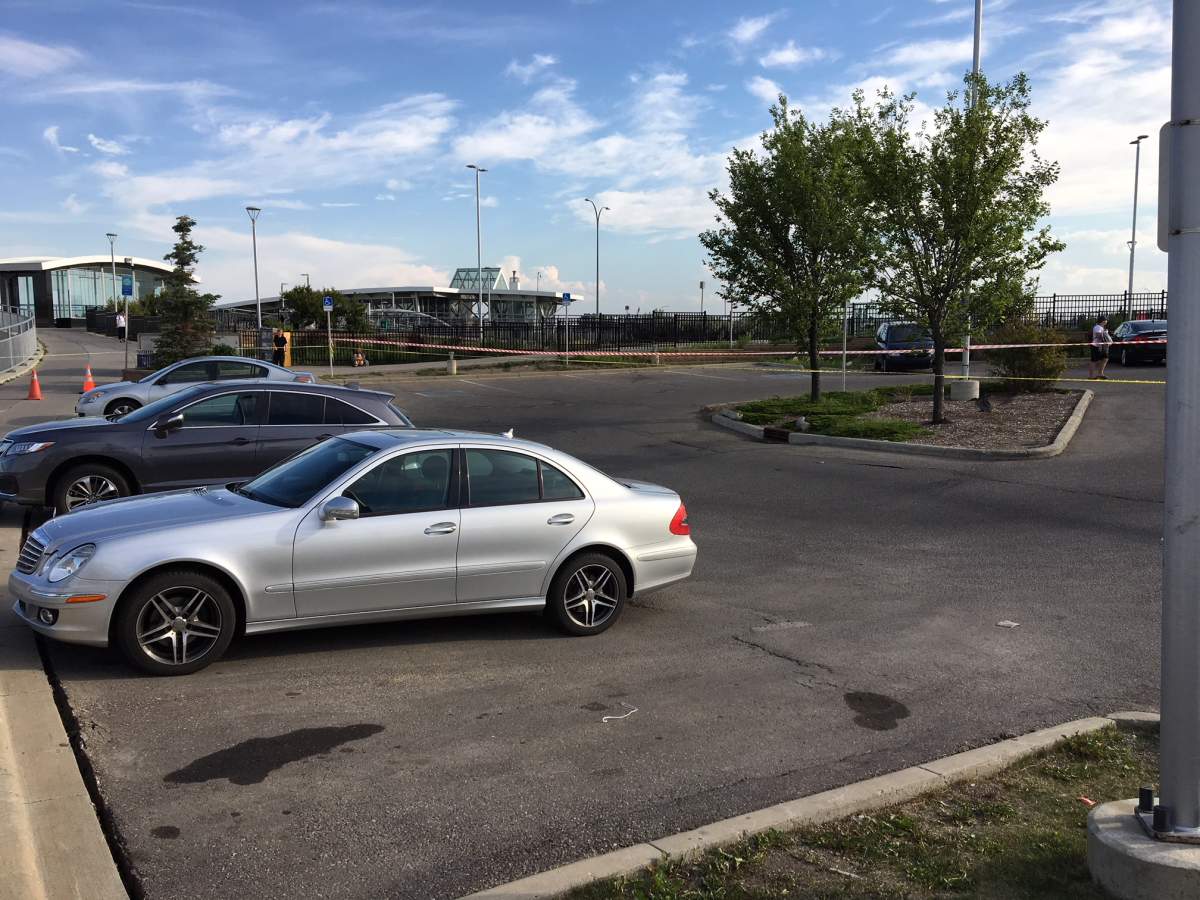Cars were trapped in an LRT parking lot on Tuesday evening after a sinkhole appeared.