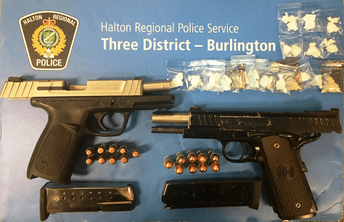 Halton police say they seized two guns and about 10 grams of crack cocaine during the arrest in Mississauga on Friday night.