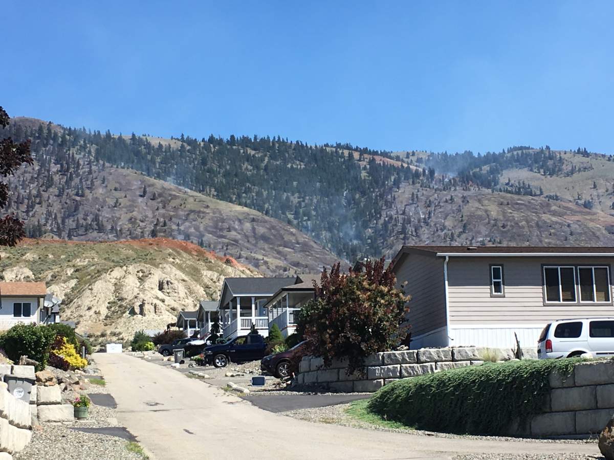 Burnt area behind homes on Shuswap Road in Kamloops.