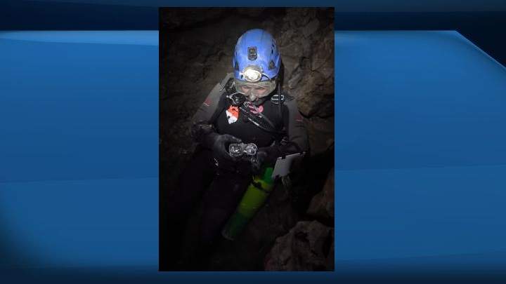 Kathleen Graham leads an expedition of Bisaro Anima, which she calls the deepest cave in Canada, near Fernie, B.C., in 2018. The Alberta-based explorer says her heart goes out to the members of a boys' soccer team as they await rescue from a partly flooded cave in Thailand. 