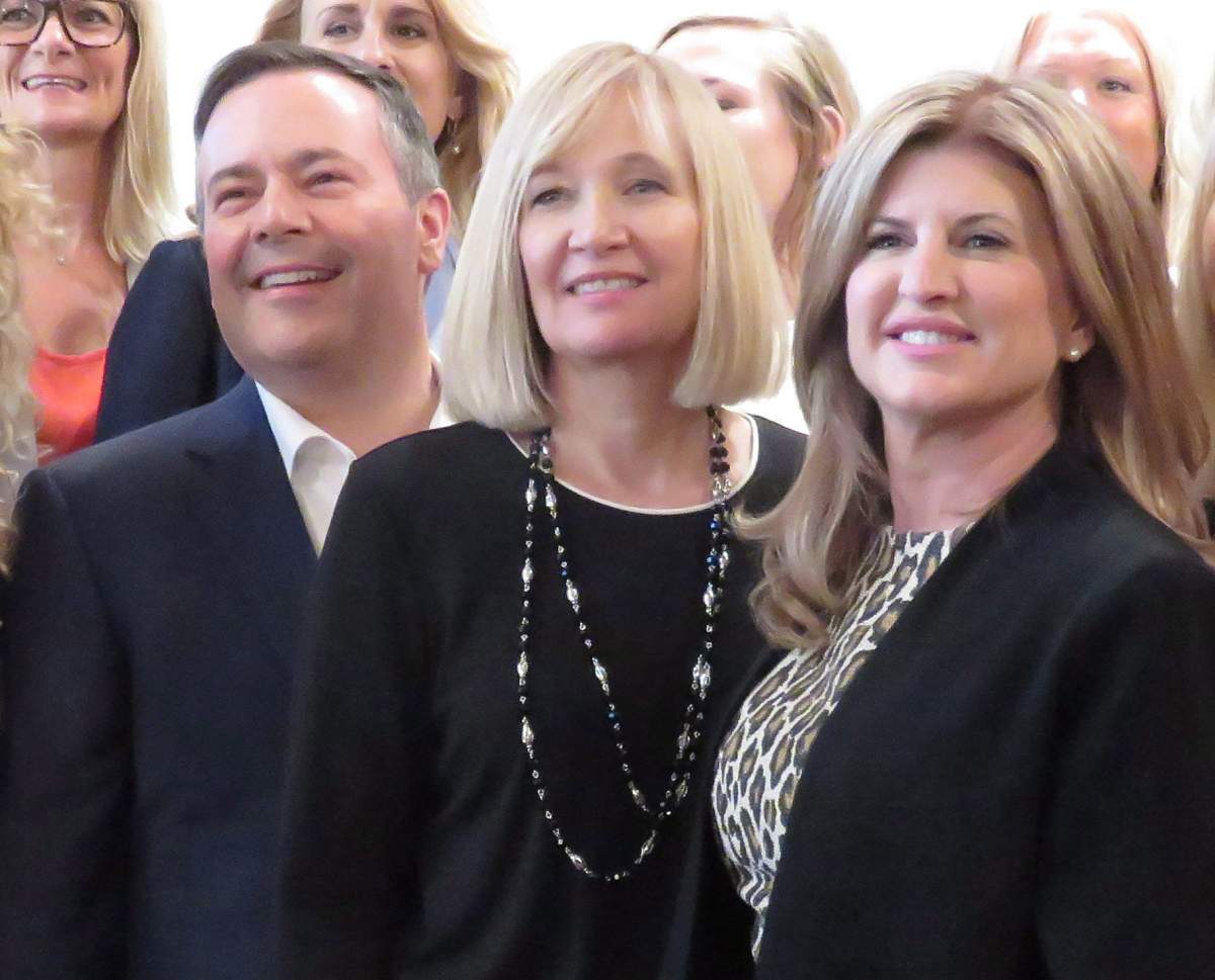Alberta United Conservative Leader Jason Kenney stands with Laureen Harper, wife of former prime minister Stephen Harper, centre, and Former federal Conservative Leader Rona Ambrose at the launch of a non-profit group to mentor women to run for conservative political parties in Edmonton on Tuesday July 24, 2018.