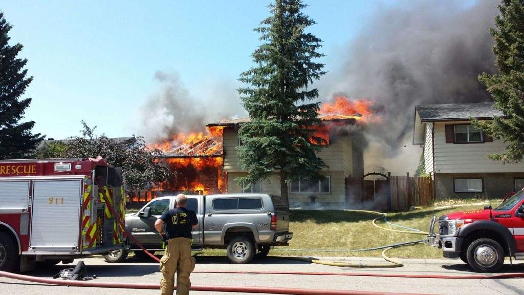 Neighbours told Global News the fire engulfed much of the home within minutes.