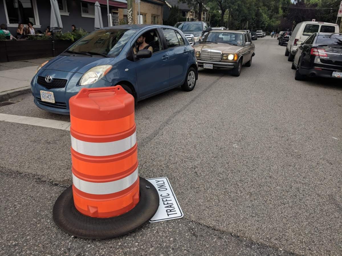 A ‘local traffic only’ sign on Commercial Drive, Thursday, July 5.