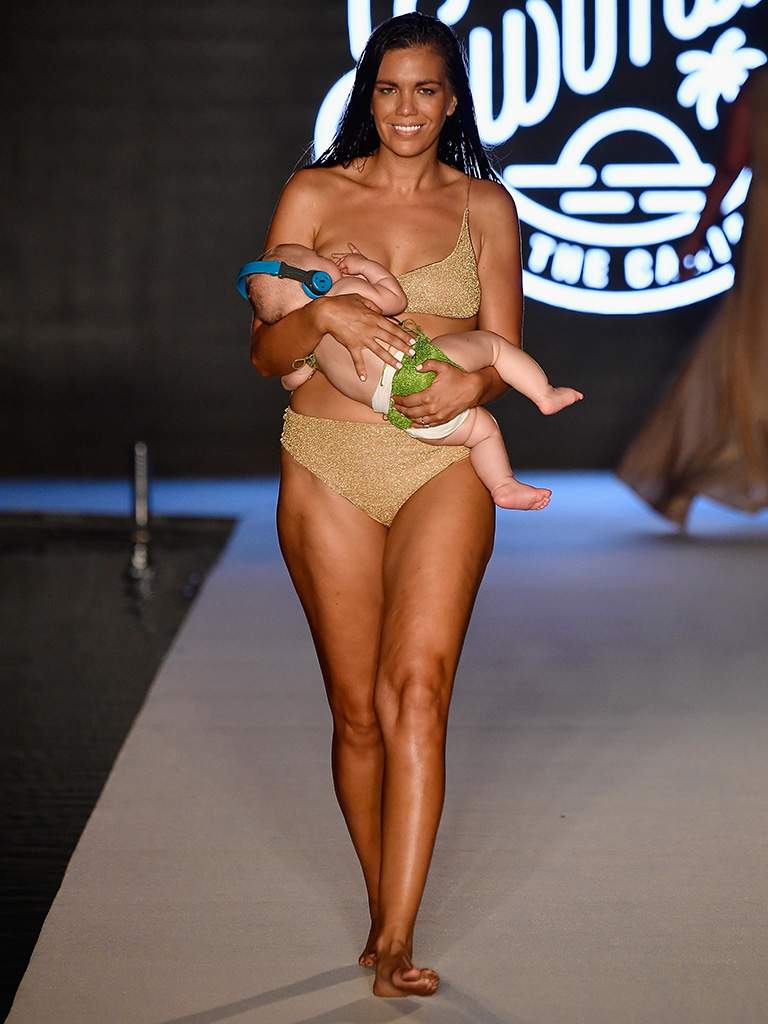 Breastfeeding model causes uproar on the Sports Illustrated catwalk - image