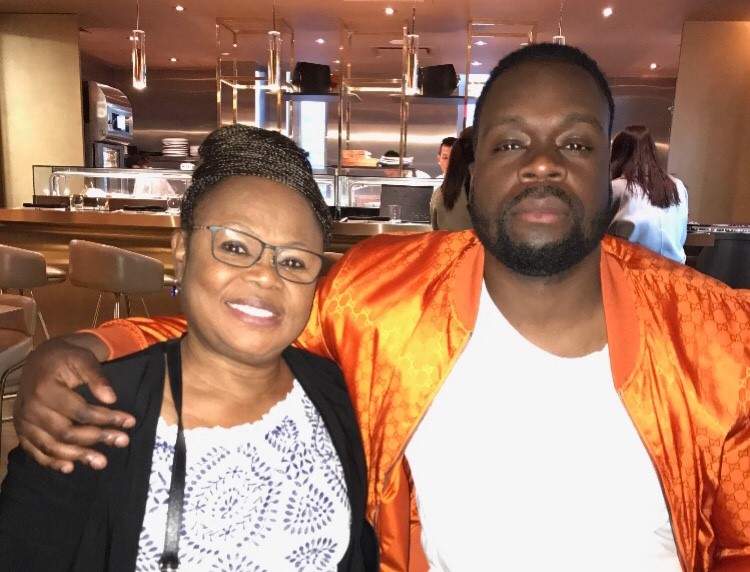 Ernest ‘Kosi’ Modekwe (right) poses with his mother in this undated picture. The 28-year-old was shot to death Saturday.