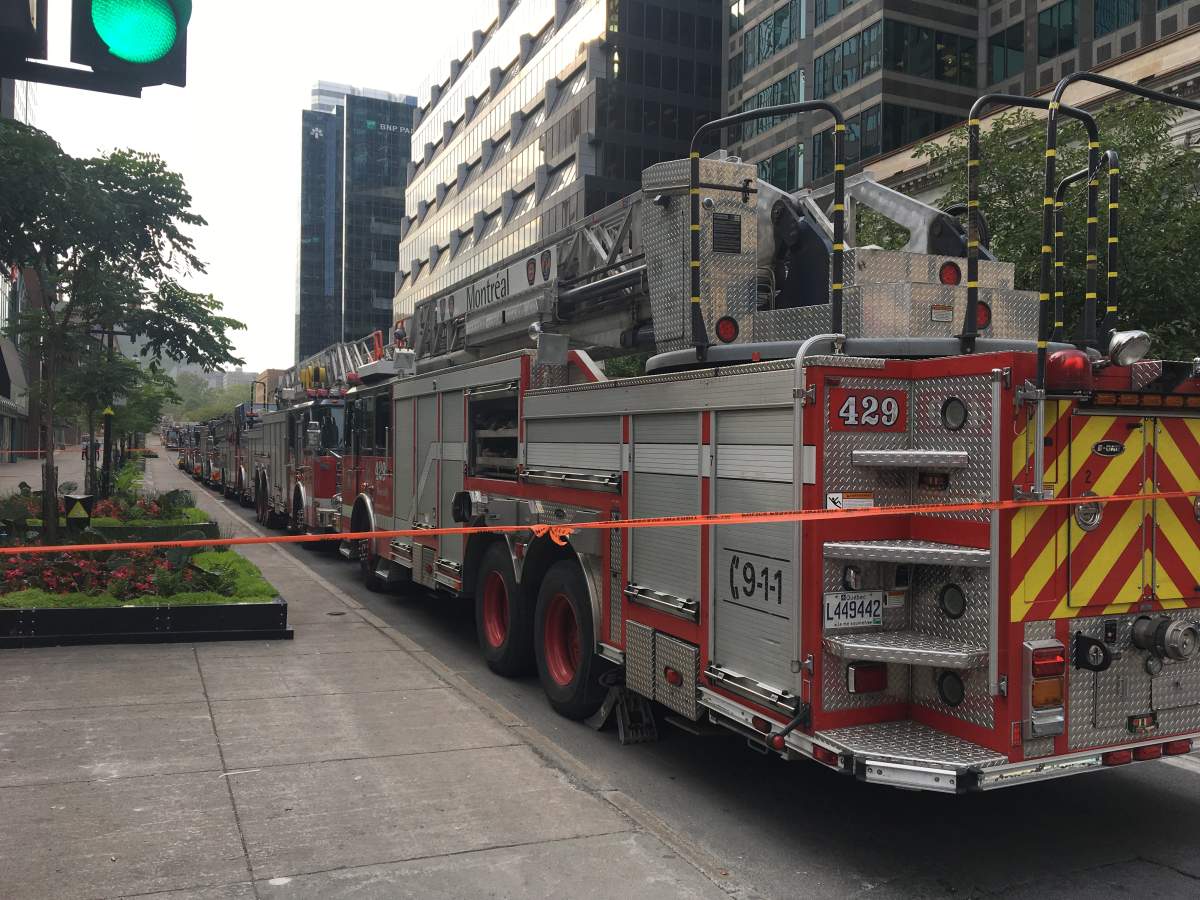 A line of fire trucks outside the blaze on Friday evening.