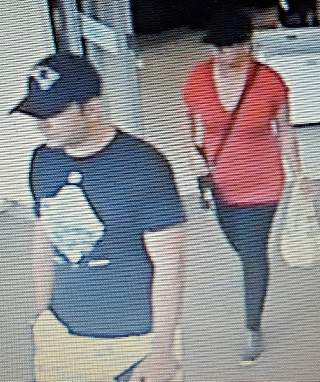 Police say this man and woman are suspects in connection with the scam.