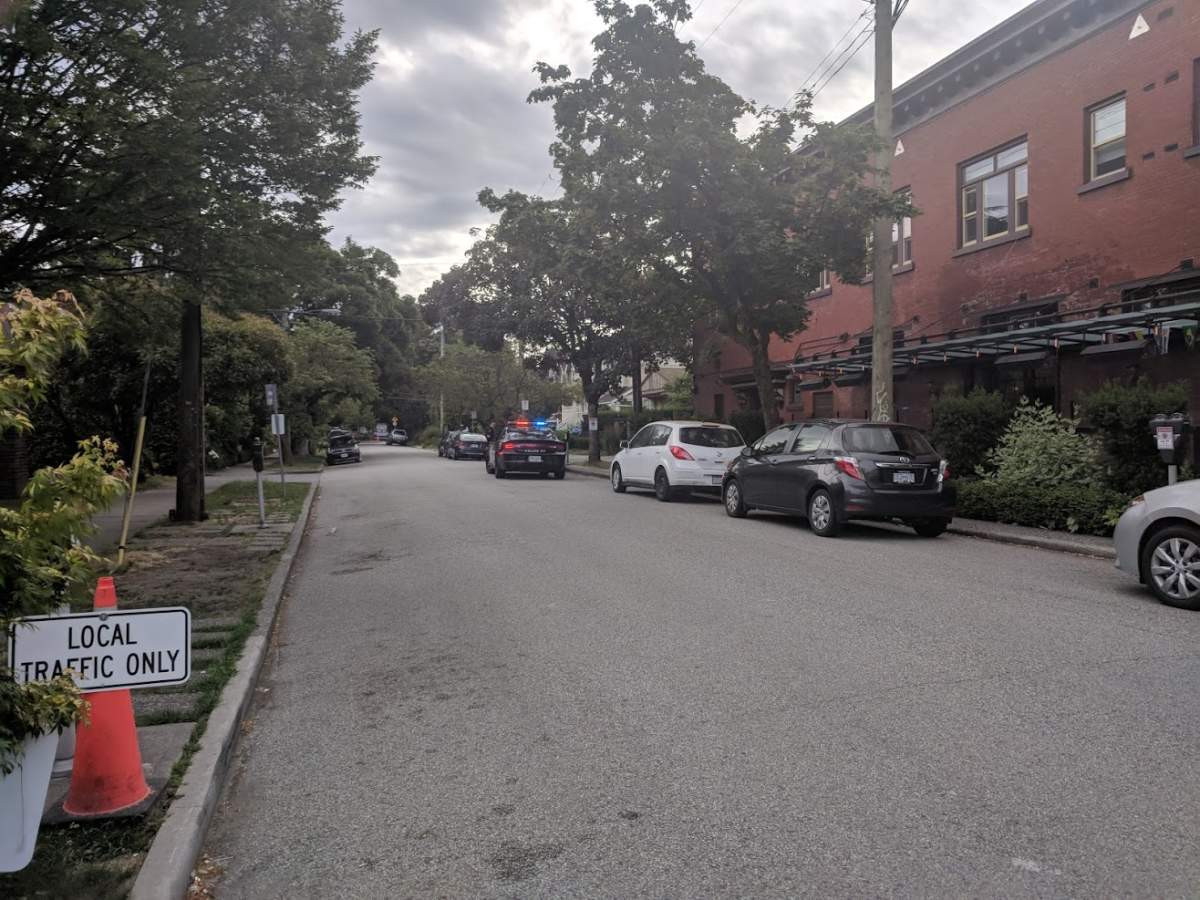 Vancouver police on a side street near Commercial Drive, Friday, July 6.