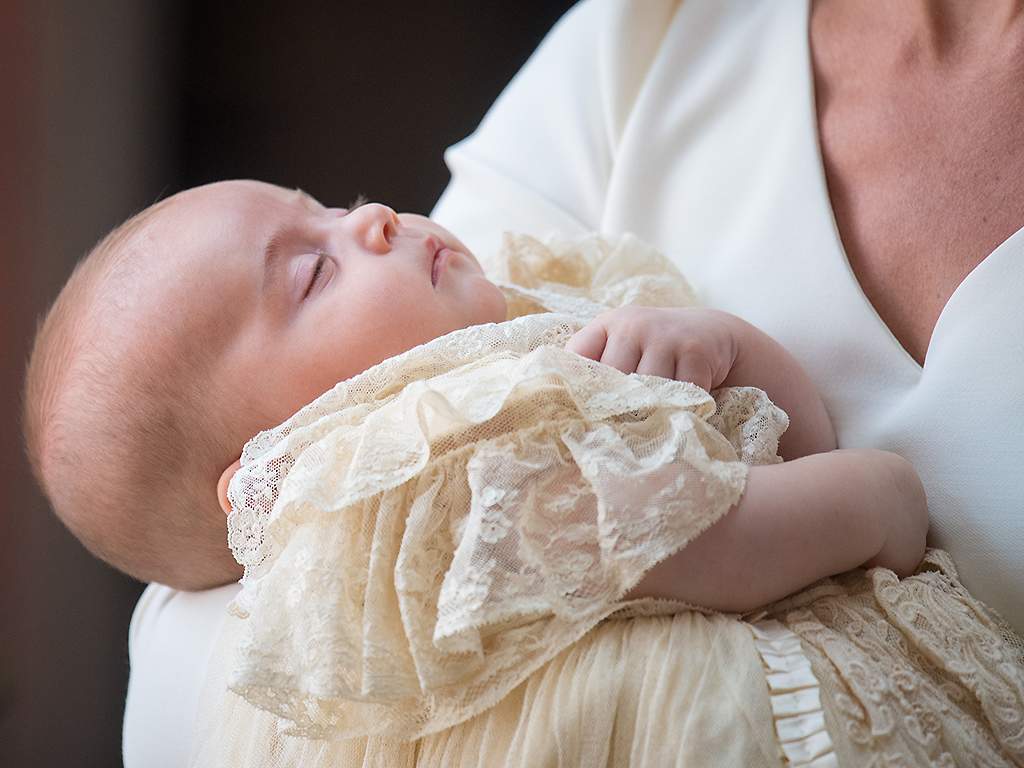 The Duchess of Cambridge carries Prince Louis as they arrive for his christening service at St James’s Palace on July 9, 2018 in London, England.