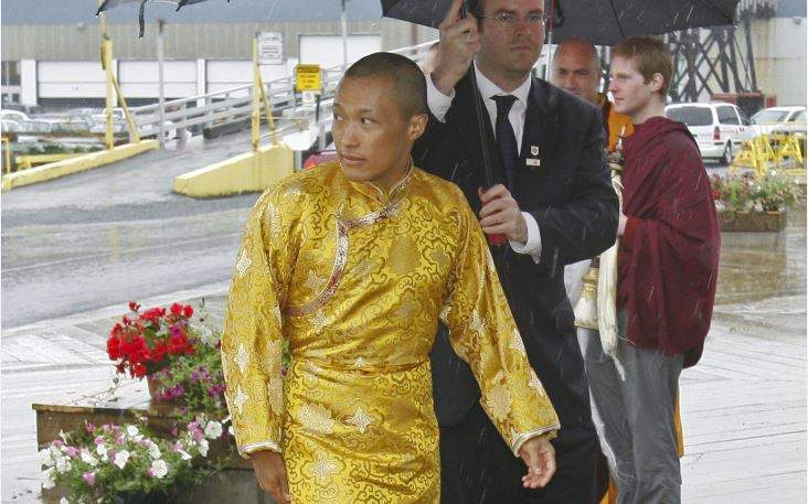 Sakyong Mipham Rinpoche arrives in the rain for his Tibetan Buddhist royal wedding to Princess Tseyang Palmo in Halifax on Saturday, June 10, 2006. The 43-year-old Sakyong, son of the movement's founder, is the spiritual leader for more than 10,000 Shambhala Buddhists around the world. 
