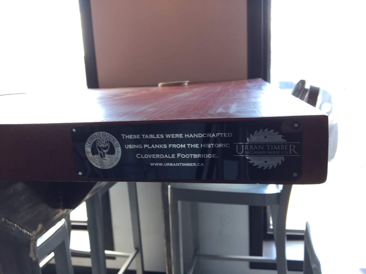 Each piece of furniture made from the footbridge will have a label like the one seen above.