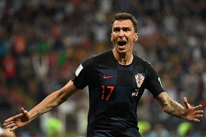 Croatia’s forward Mario Mandzukic celebrates after scoring his team’s second goal during the Russia 2018 World Cup semi-final match between Croatia and England at the Luzhniki Stadium in Moscow on July 11, 2018.