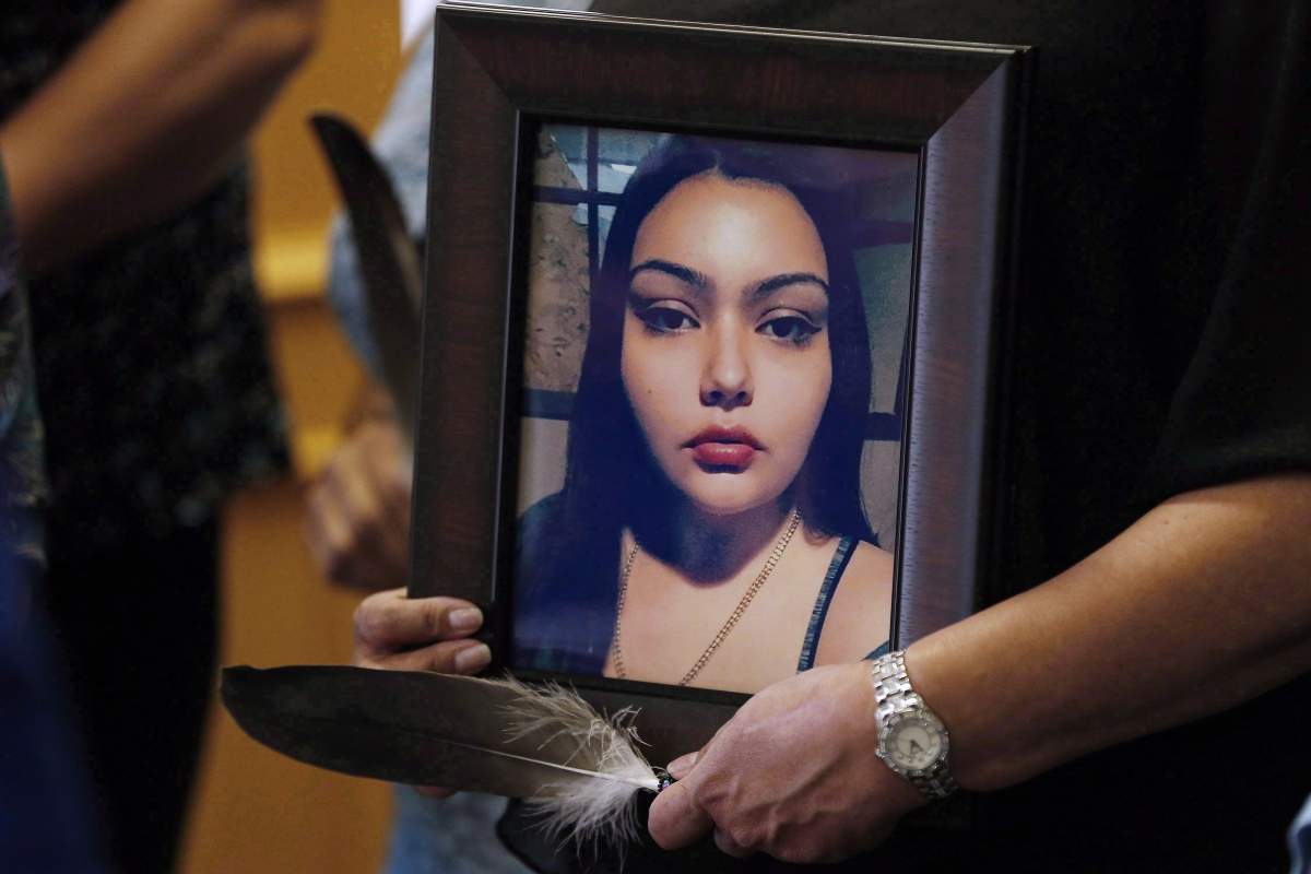 Delores Daniels holds a photo of her daughter Serena McKay, who was murdered in Sagkeeng, during a press conference calling for a re-organization of the National Inquiry into Missing and Murdered Indigenous Women and Girls (MMIWG) in Winnipeg, Wednesday, July 12, 2017.