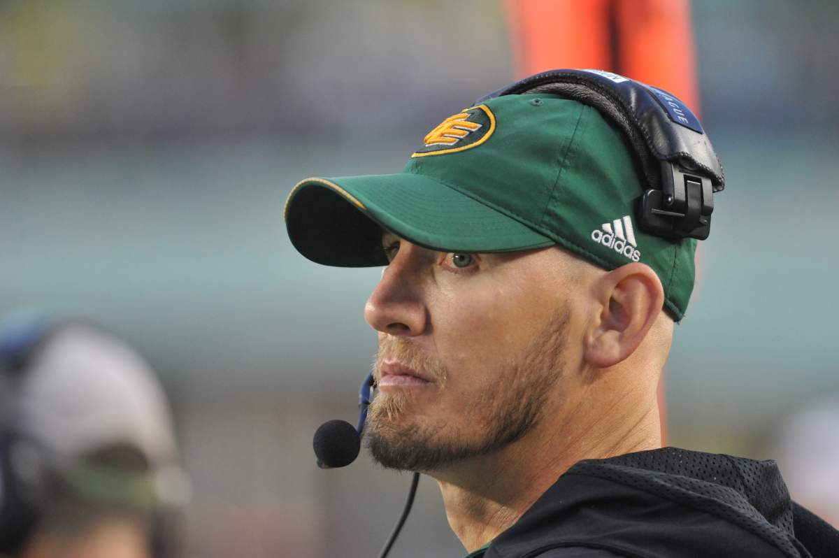 Edmonton Eskimos Head Coach Jason Maas is seen on the sidelines during the second quarter of CFL game action between the Edmonton Eskimos and the Saskatchewan Roughriders in Edmonton Thursday, Aug. 2,2018. 