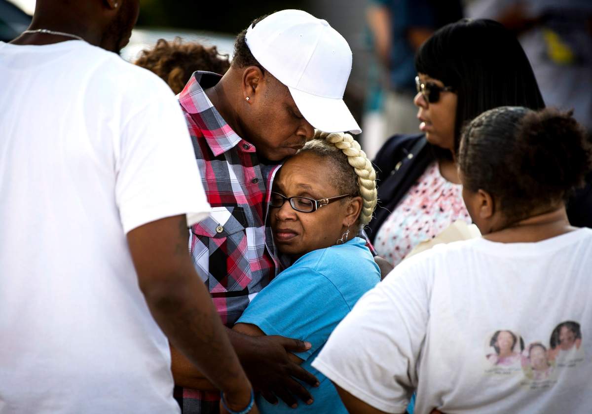 Vickie Hambrick, mother of Daniel Hambrick, is comforted by her brother Sam Hambrick Jr. after a press conference addressing a video released on the death of her son, Wednesday, Aug. 8, 2018, at the NAACP Nashville Branch in Nashville, Tenn