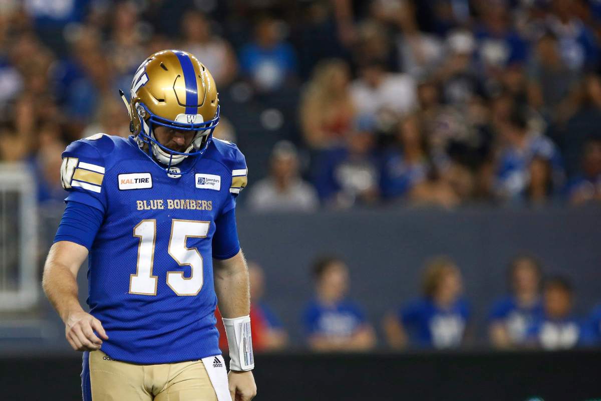 Winnipeg Blue Bombers quarterback Matt Nichols (15) walks off the field against the Ottawa Redblacks during the second half of CFL action in Winnipeg Friday, August 17, 2018. THE CANADIAN PRESS/John Woods.