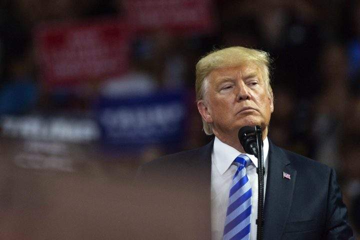 President Donald Trump takes the stage at a rally in support of the Senate candidacy of West Virginia's Attorney General Patrick Morrisey, Tuesday, Aug. 21, 2018.